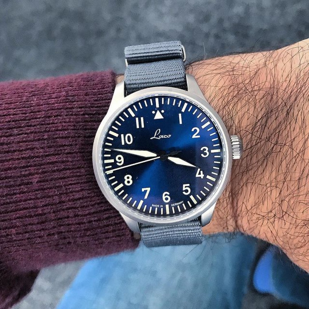 Wearing this beautiful blue since 3 days now and it is still so much fun to look at this watch. The dial is very hard to describe as it is not that typical sun burst glossy blue that you know from most other watches. It has a matte finish on top but changes according to the light situation to a shiny blue again. Also the hour markers seems to look little bit yellow on some pics but under light condition you recognize the white printing. Also the lume is fantastic with a mix of green/blue but the brightness doesn’t hold that long compared to Japanese divers for example. The case has a brushed finish and the color of the original nato strap is something between light blue and grey. For somebody who is looking for a modern Flieger this Laco Augsburg Blaue Stunde 39mm should be on the list.

#Laco #LacoAugsburg #Augsburg39 #MadeinGermany #automatic #Flieger #BlaueStunde #BlaueStunde39 #watch #wristwatch #watches #watchcollector #Fliegeruhr #Fliegerwatch #watchoftheday #watchesofinstagram #watchgram #watchmade #watchfam #watchaddict #watchesofinsta #style #watchnerd #watchlover #everydaywatch  #watchphotography #watchmade #laco1925