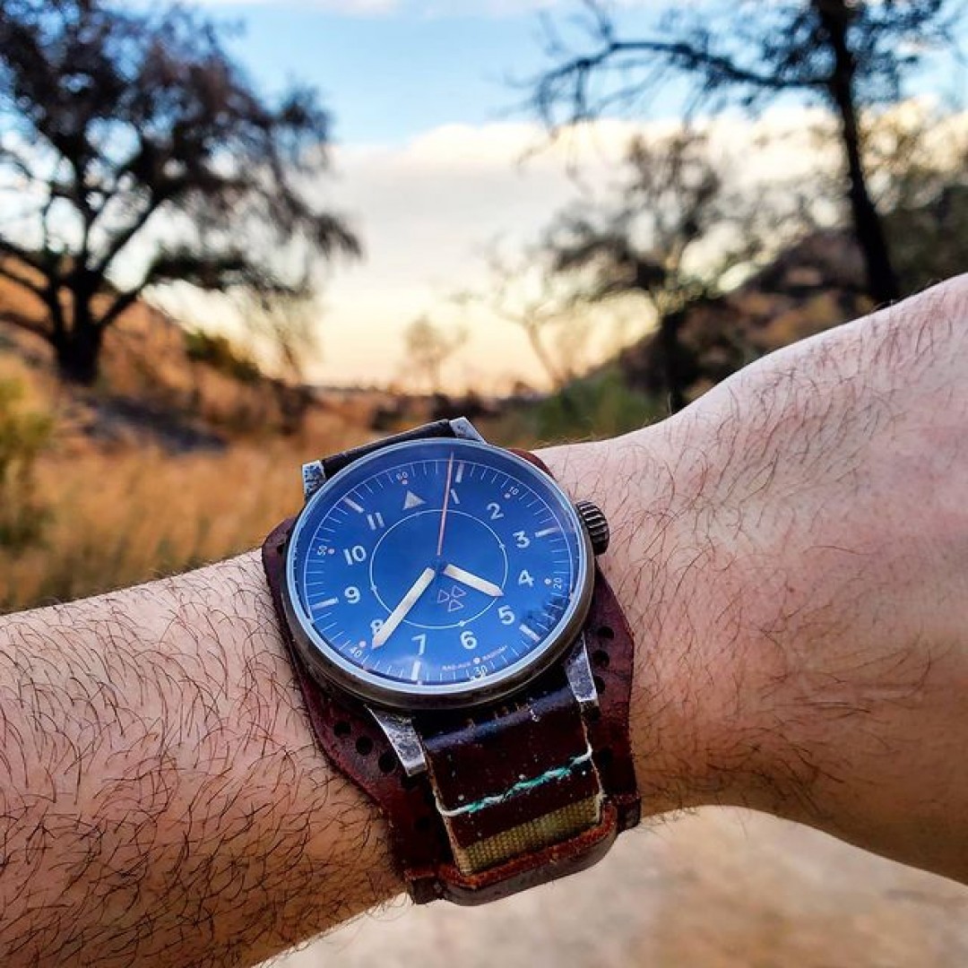 A wildfire recently swept through this area of LA. Charred trees mix with new grasses. Ideal backdrop for the laco1925 RAD-AUX watch. teenage.grandpa #watches #watchesofinstagram #womw #ablogtowatch ablogtowatch #lacowatches #lacoradaux